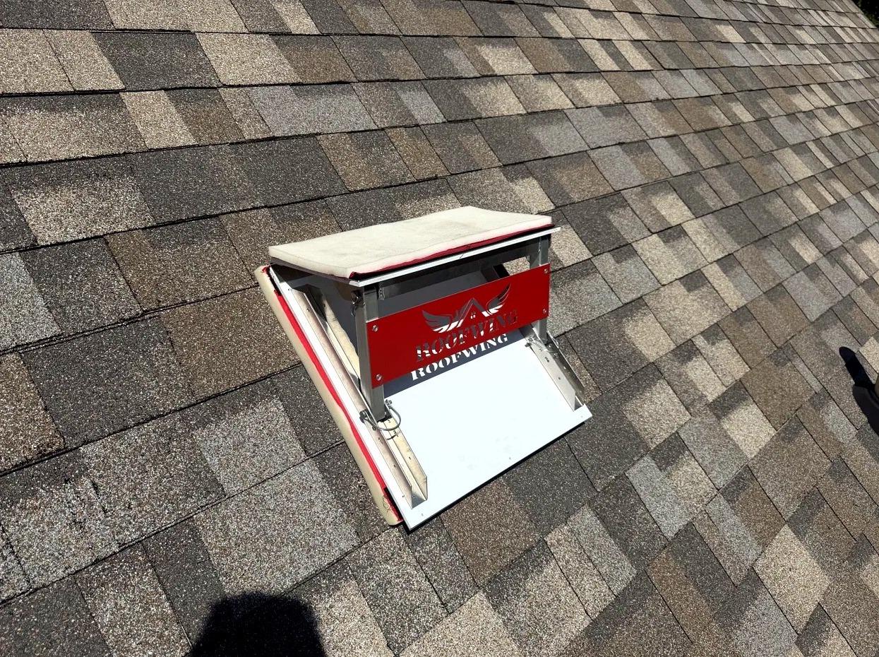Professional roofer using The Roofwing